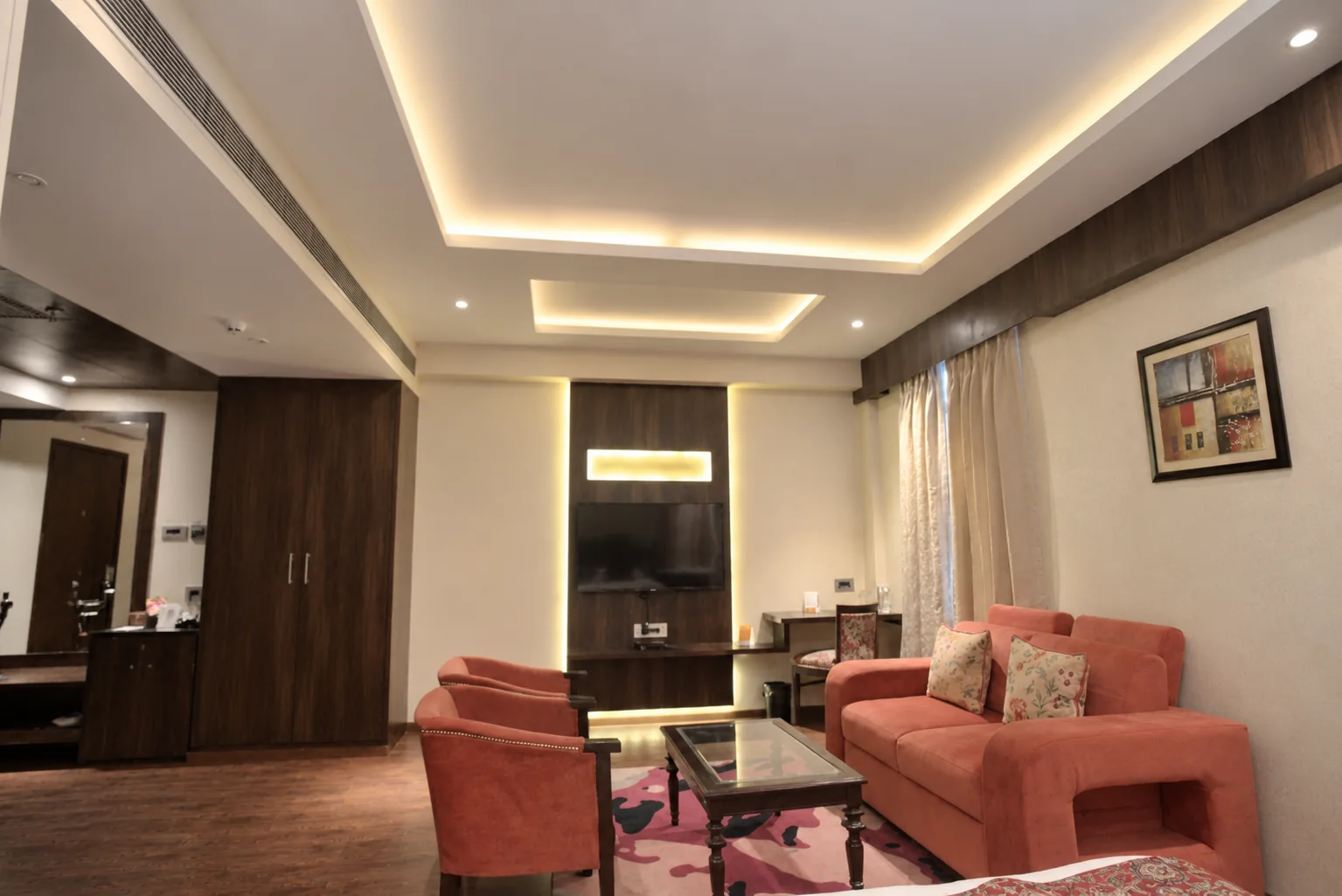 Guest room sitting area at Hotel Ranbirs, Gomti Nagar
